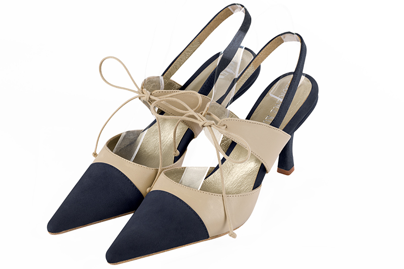 Navy blue and champagne beige women's open back shoes, with an instep strap. Pointed toe. High slim heel. Front view - Florence KOOIJMAN
